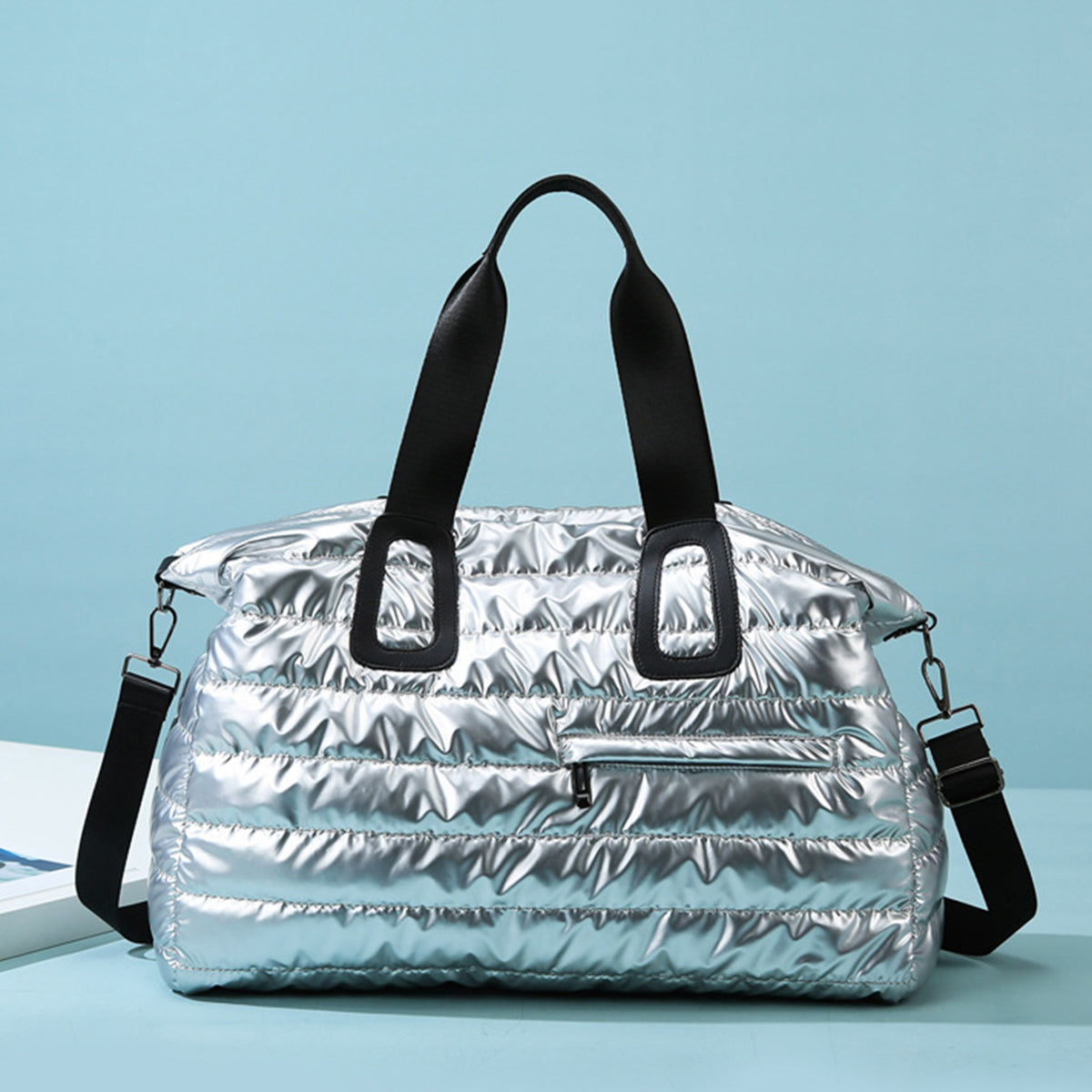Quilted Oversize Travel Bag front view silver color side pocket detail
